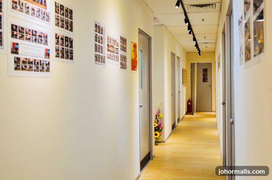 Hallway with photos and doors