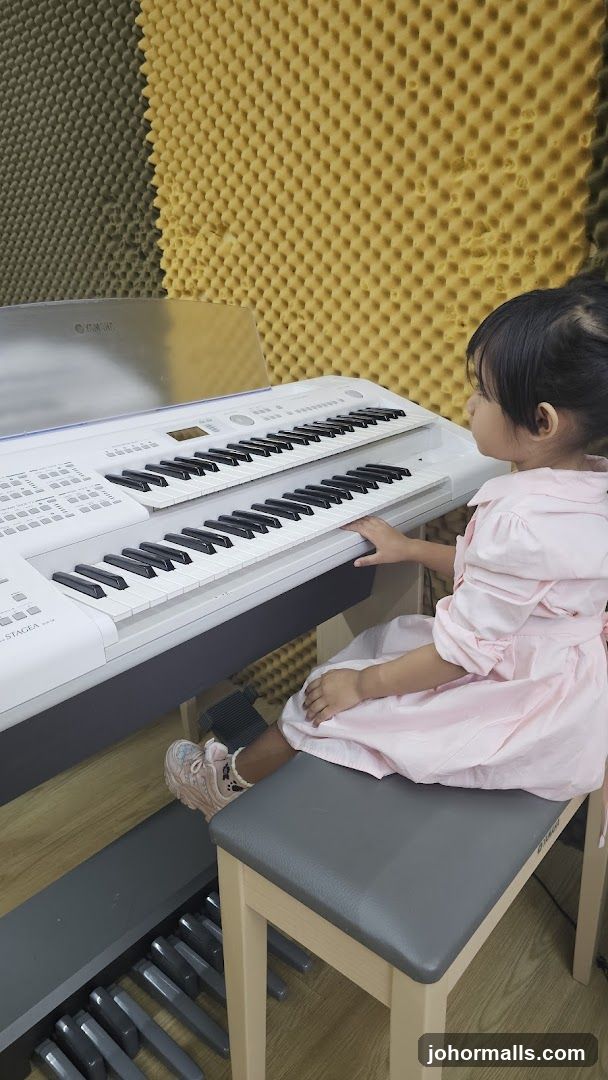 Young girl playing a keyboard