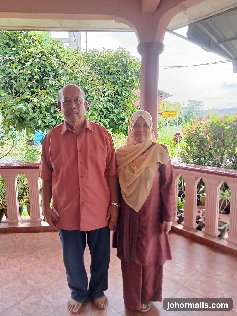 Elderly couple posing for a photo