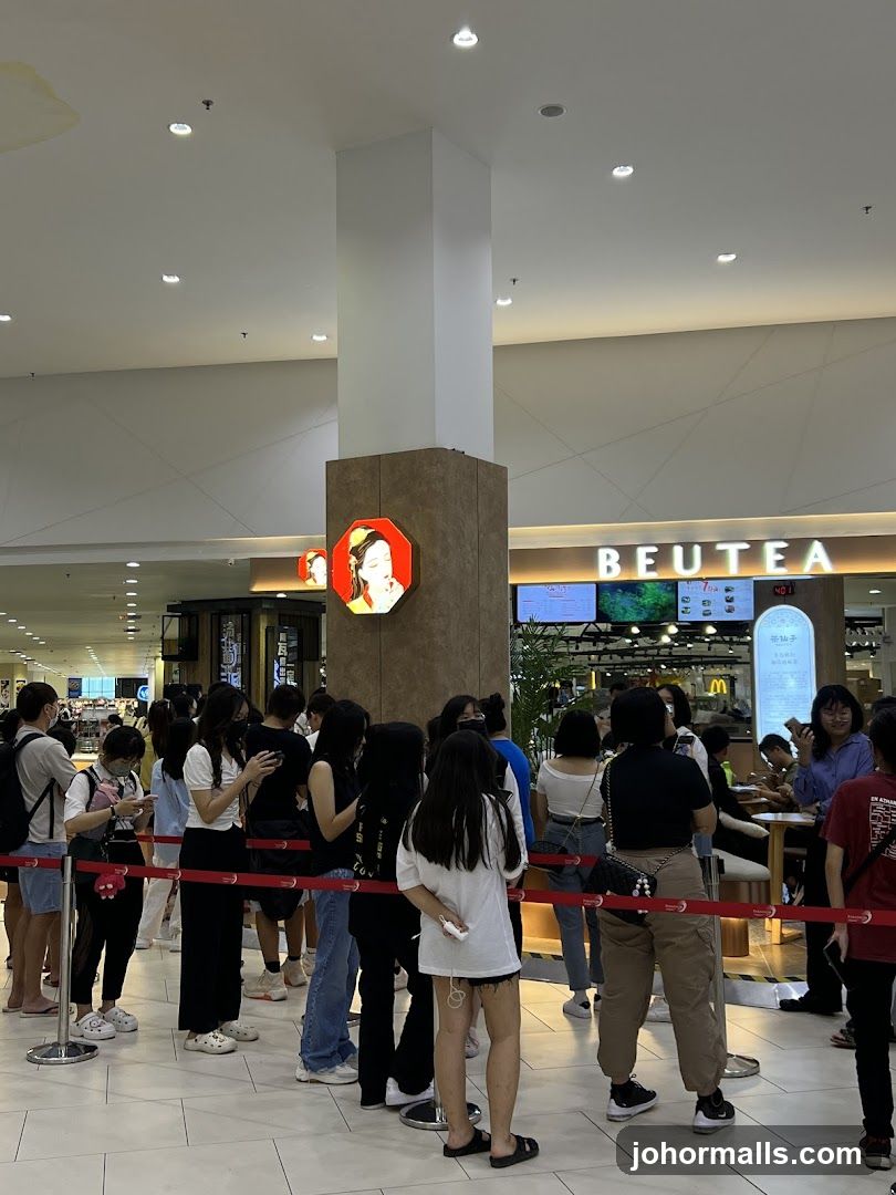 People queuing at a food establishment