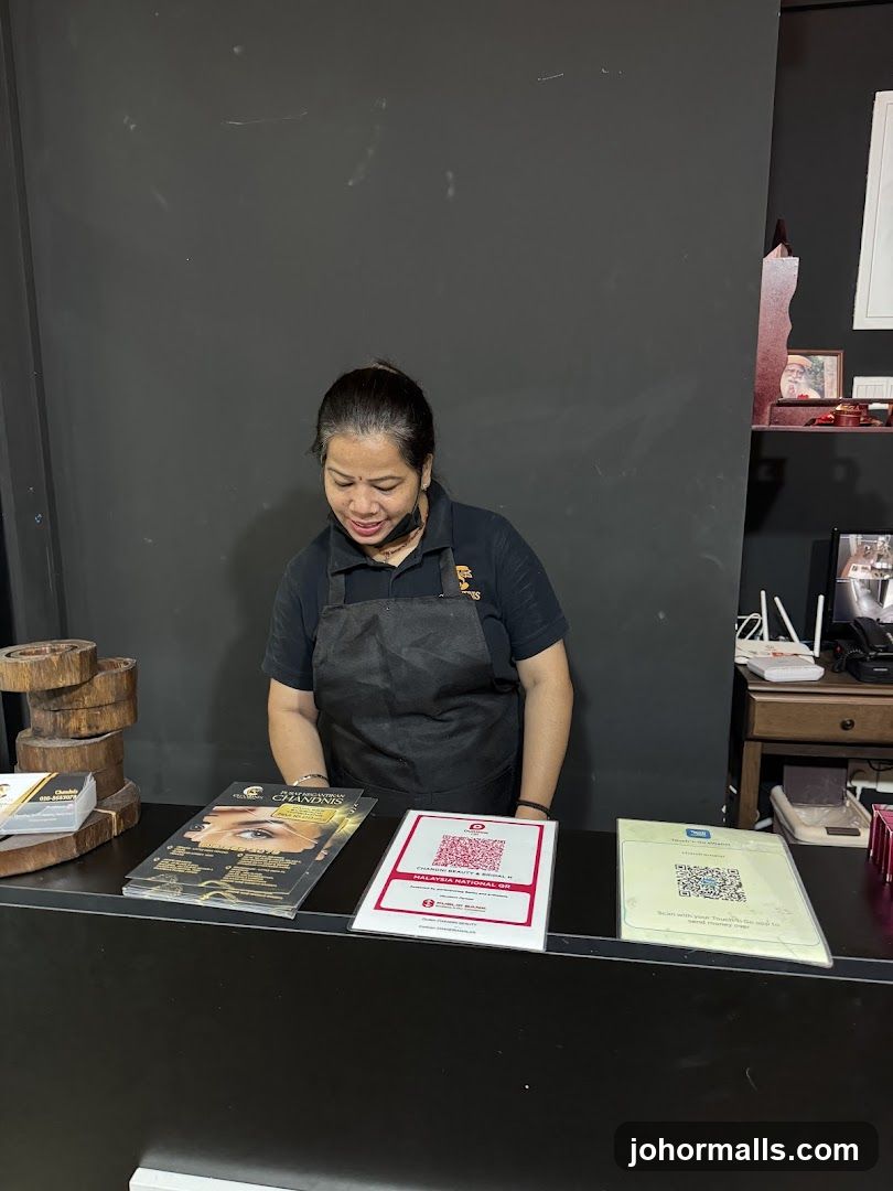 Woman at Counter with Brochures and QR Codes