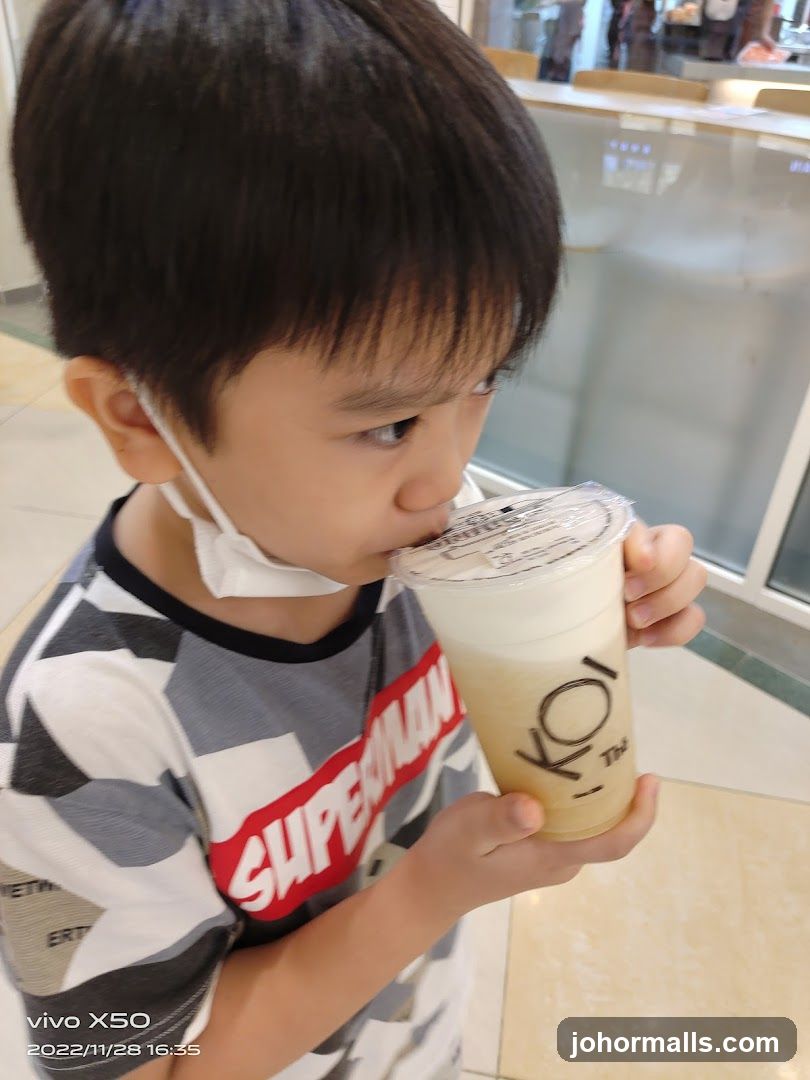 Boy Drinking Bubble Tea