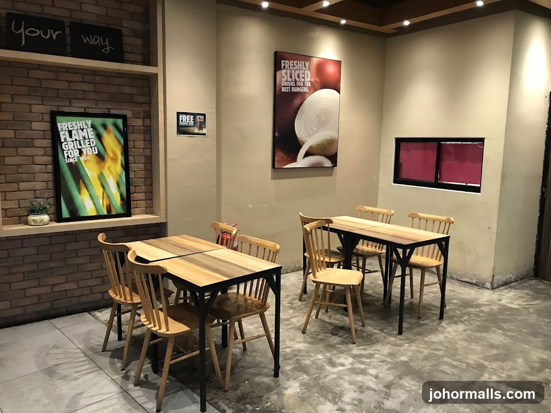 Restaurant Interior with Seating and Advertisements
