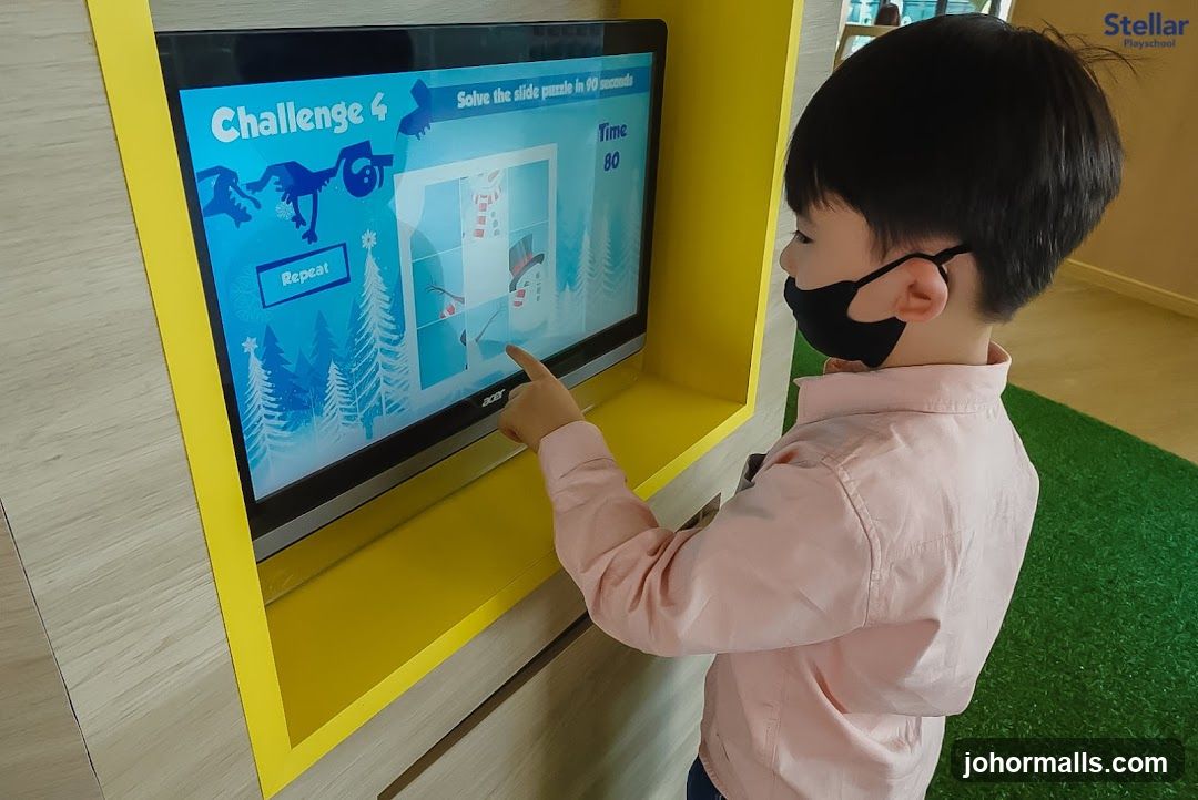 Child Playing a Slide Puzzle Game