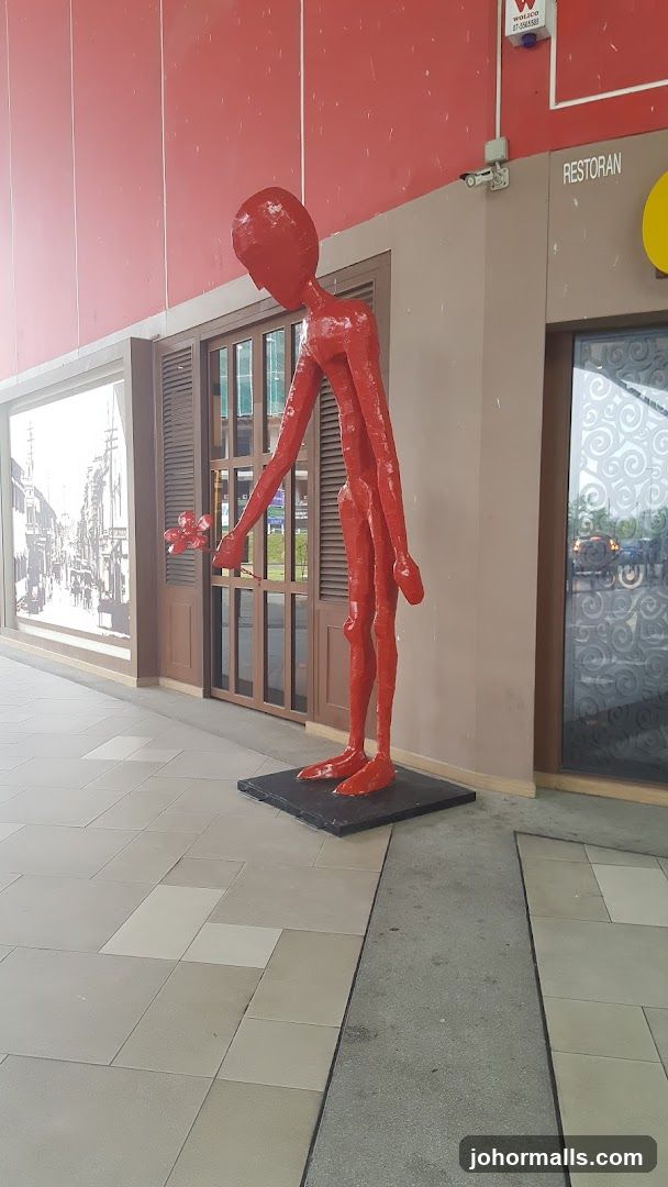 Red Sculpture in Front of Restaurant