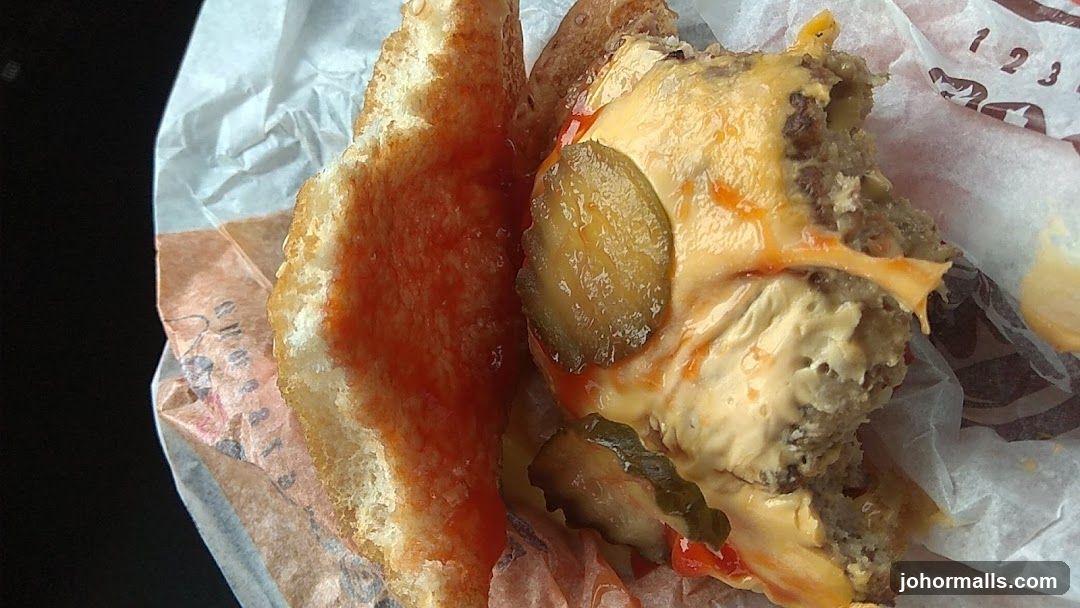 Partially Eaten Cheeseburger