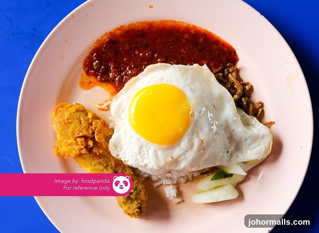 Nasi Lemak with Fried Chicken and Egg