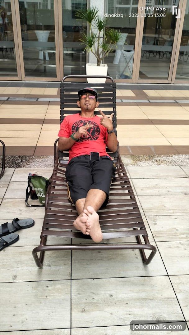 Man relaxing on a lounge chair