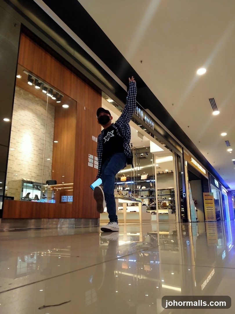 Person posing in a mall