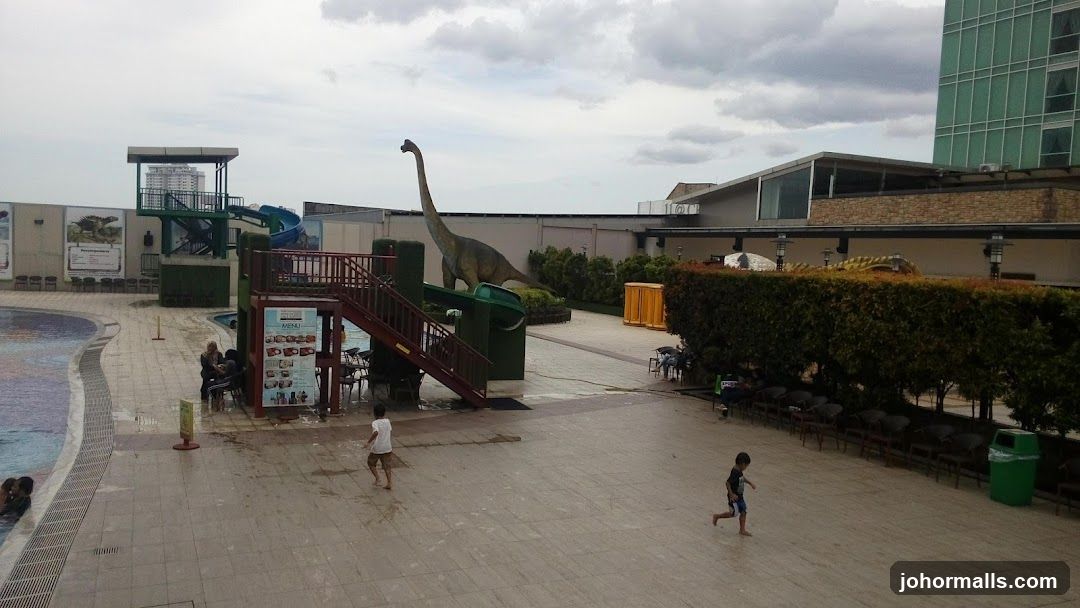 Water park with dinosaur decorations