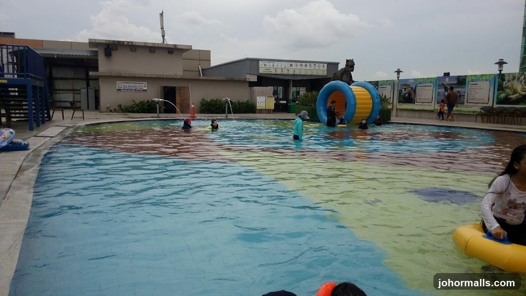 Water park with pool and inflatable attractions