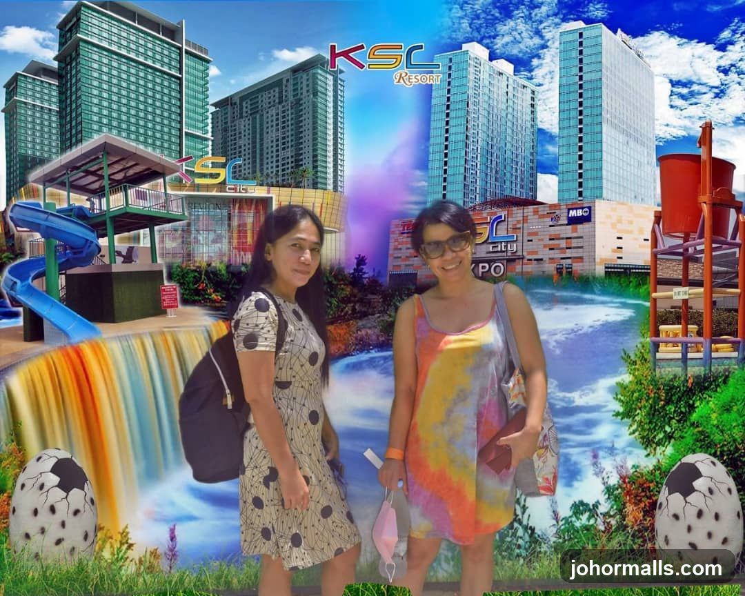 Two Women Posing in Front of a Digital Collage of a Resort