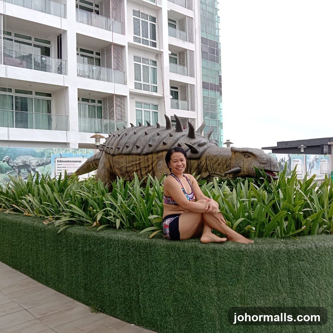 Woman Poses by Dinosaur Sculpture