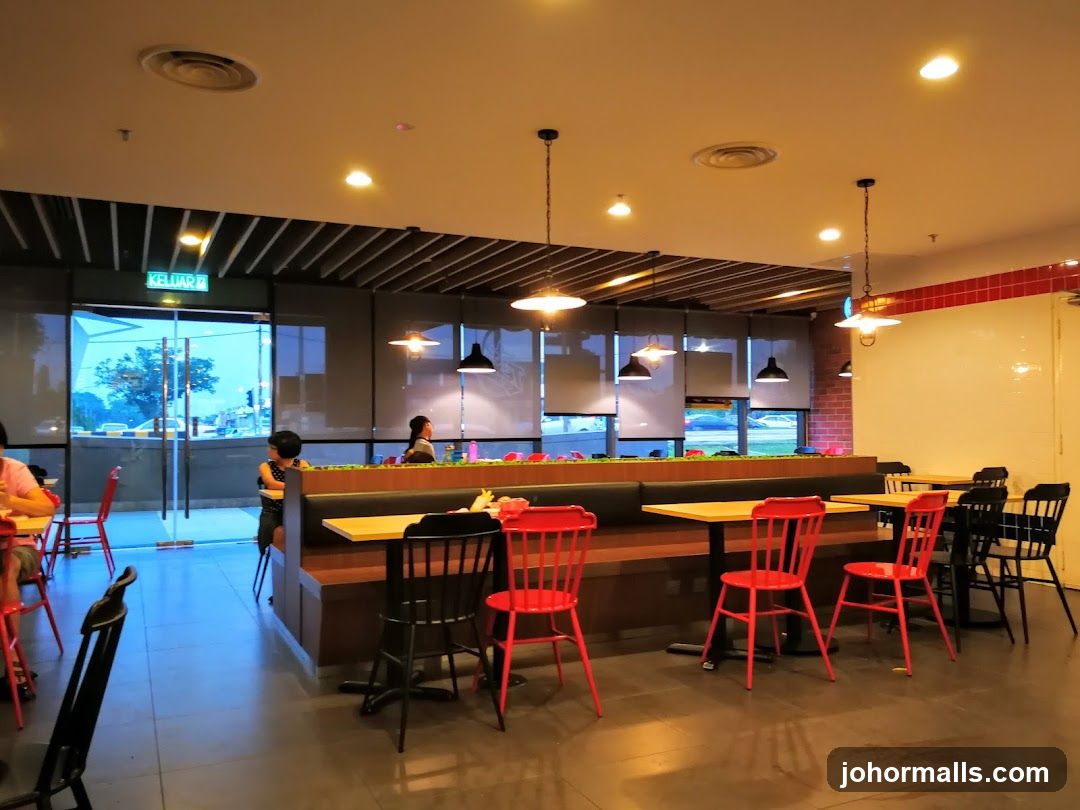 Restaurant Interior with Booth Seating and Red Chairs
