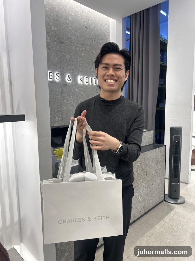 Man holding shopping bags