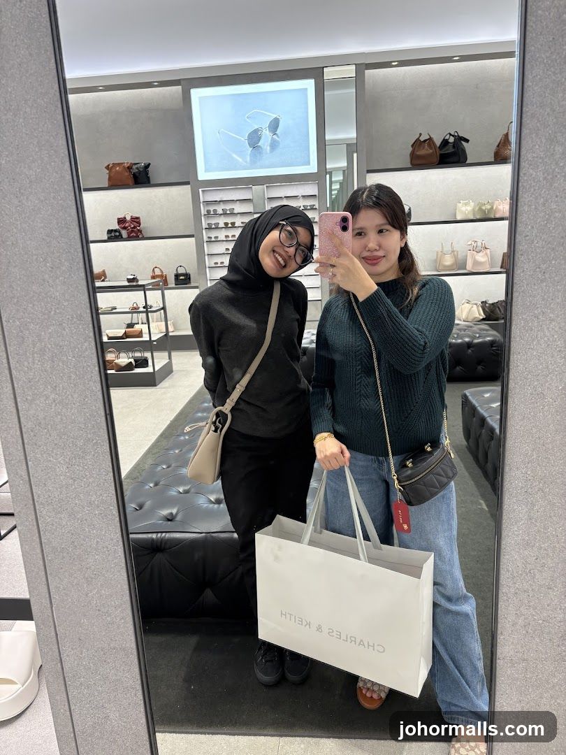 Two Women Taking a Mirror Selfie in a Store