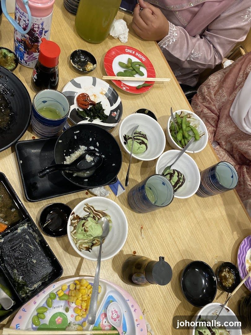 Table with leftover food and drinks