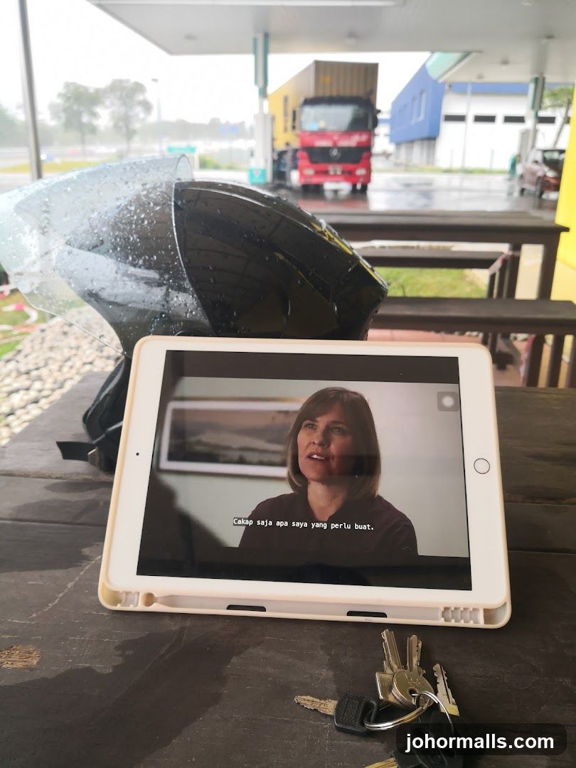 Tablet playing video at outdoor table