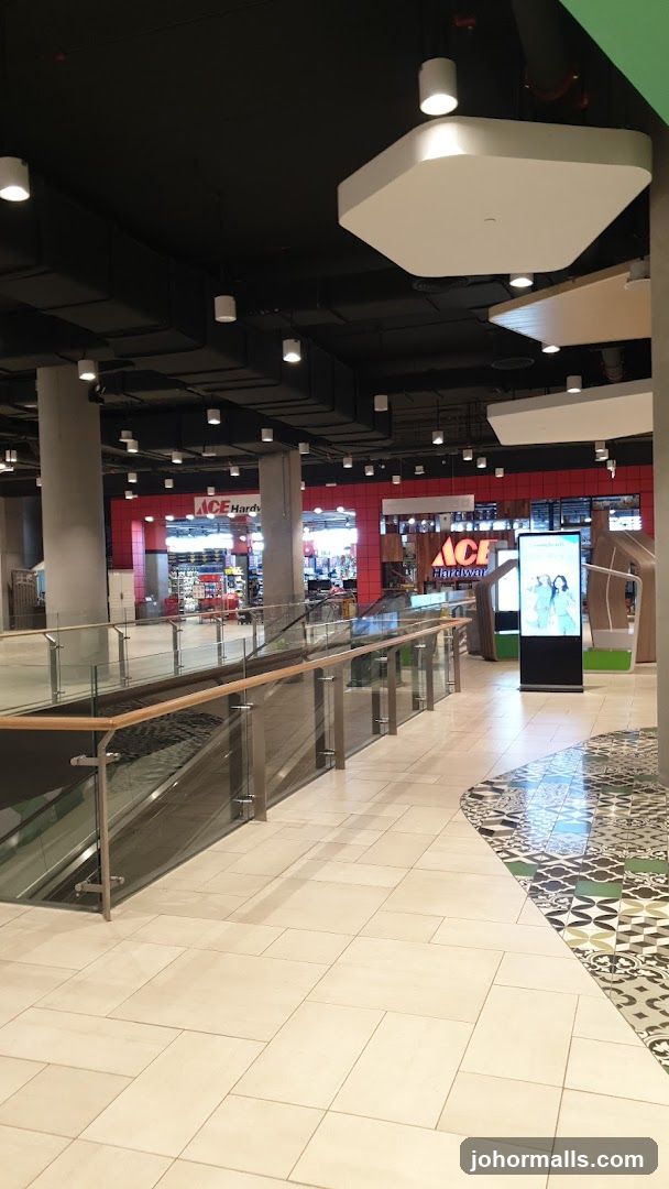Interior of a shopping mall with an Ace Hardware store visible