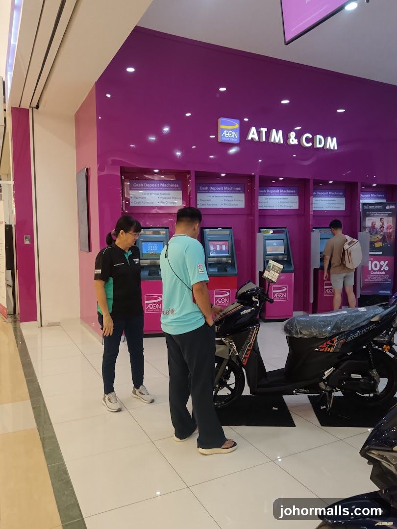 ATM and CDM area with motorcycles on display