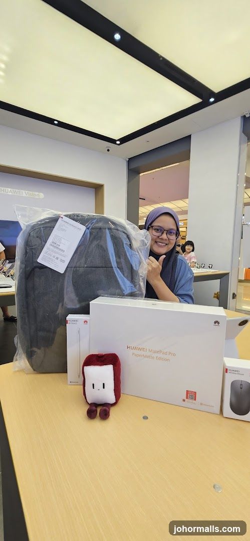 Woman with Huawei products