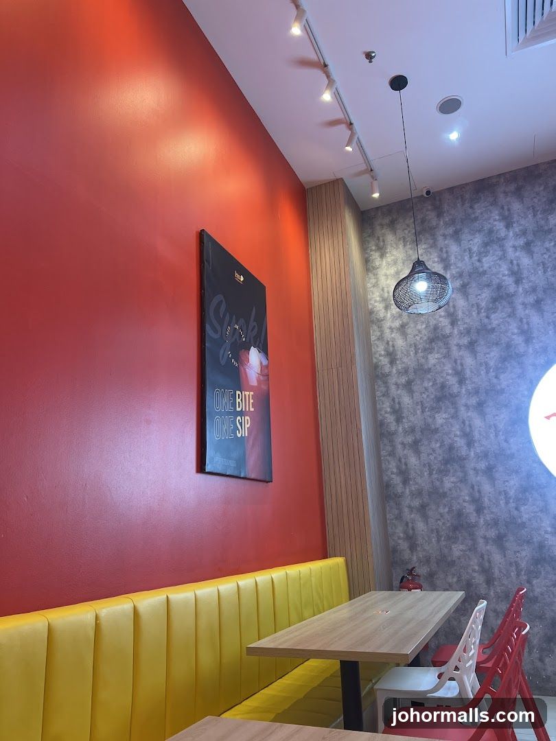 Restaurant Interior with Red and Yellow Seating