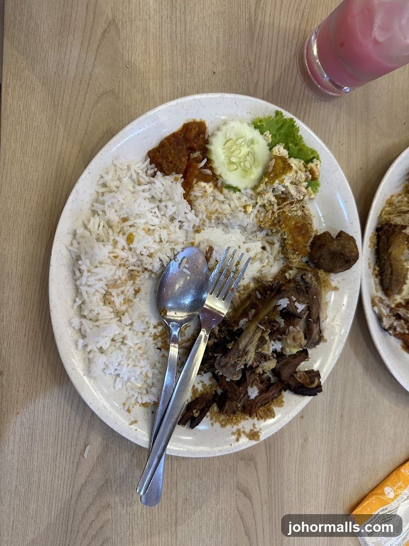Plate of food with rice and meat
