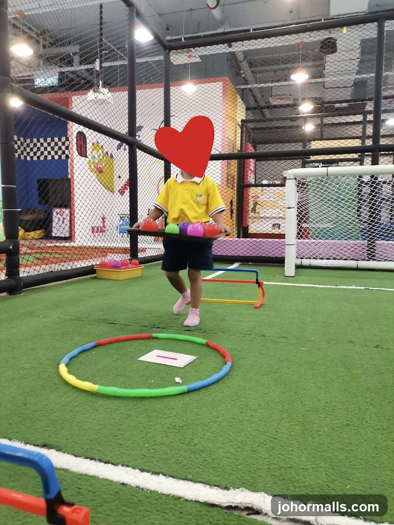 Child playing in indoor playground