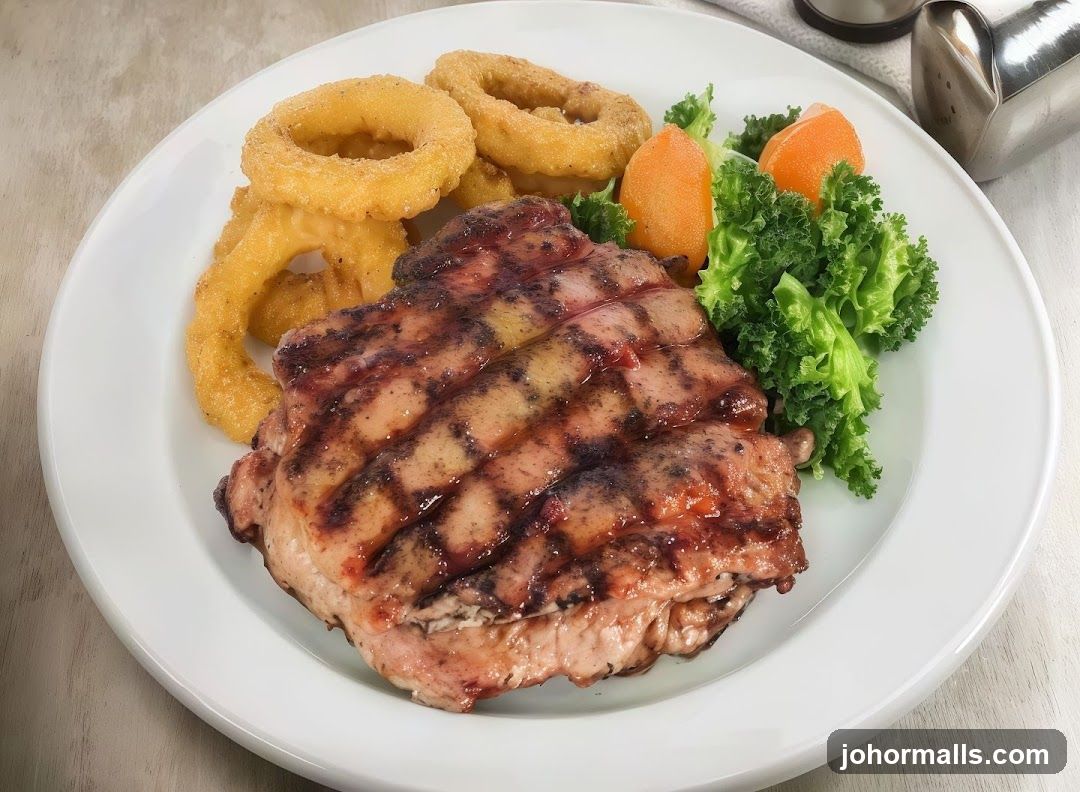 Grilled Chicken with Onion Rings and Salad