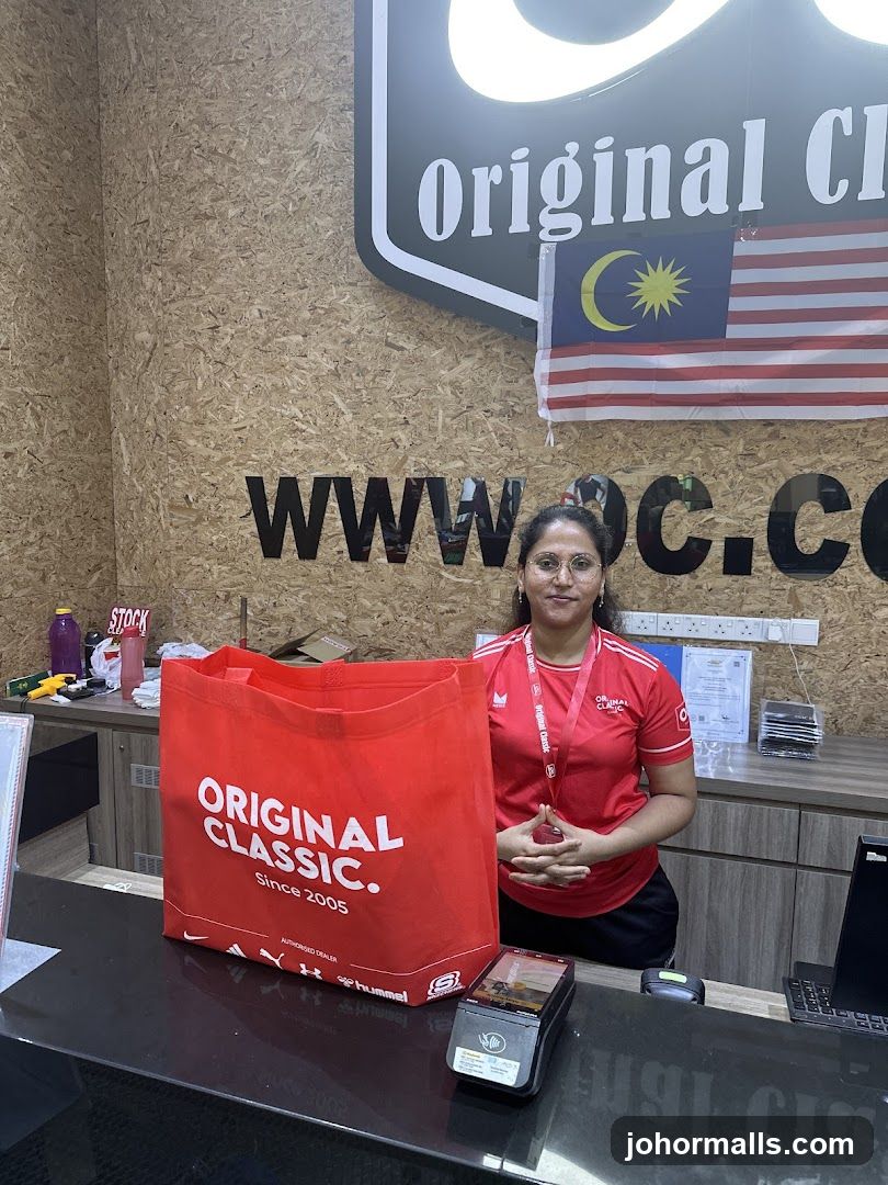 Woman at Counter with Shopping Bag