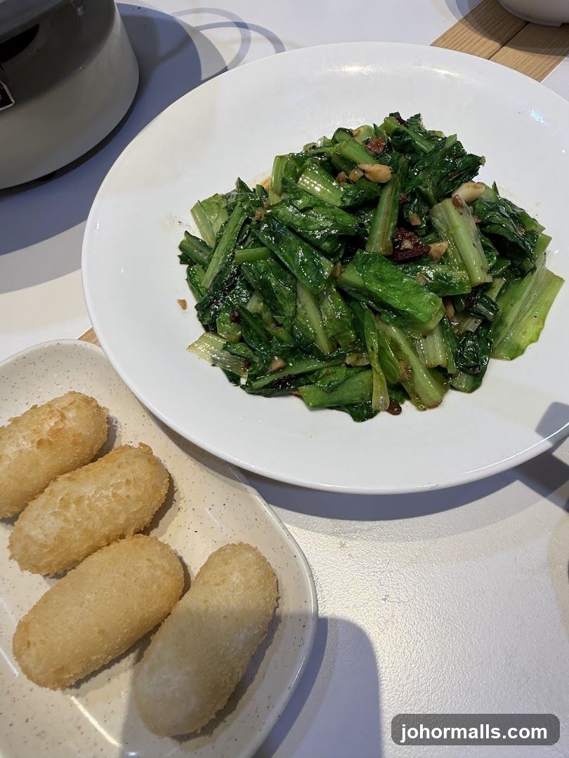Stir-fried Greens and Fried Rice Cakes