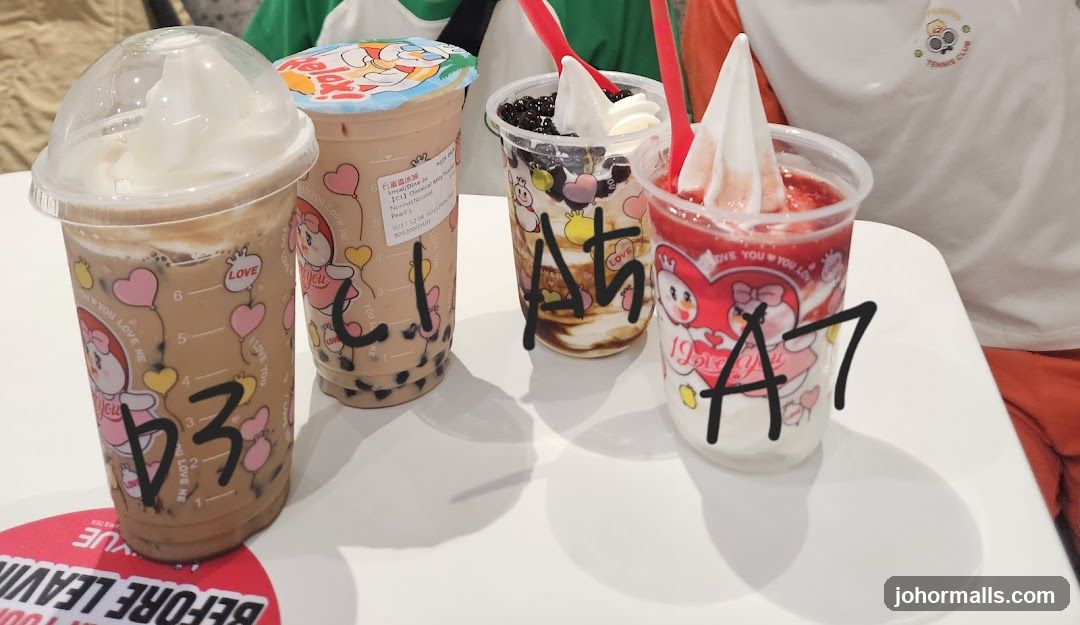 Four drinks with toppings