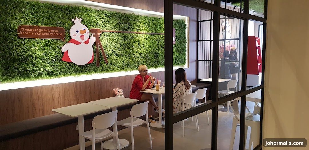 Modern cafe interior with green wall