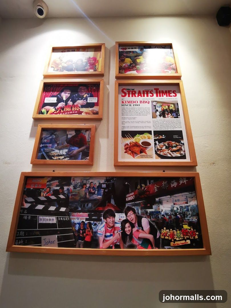 Framed Photos and Newspaper Clipping