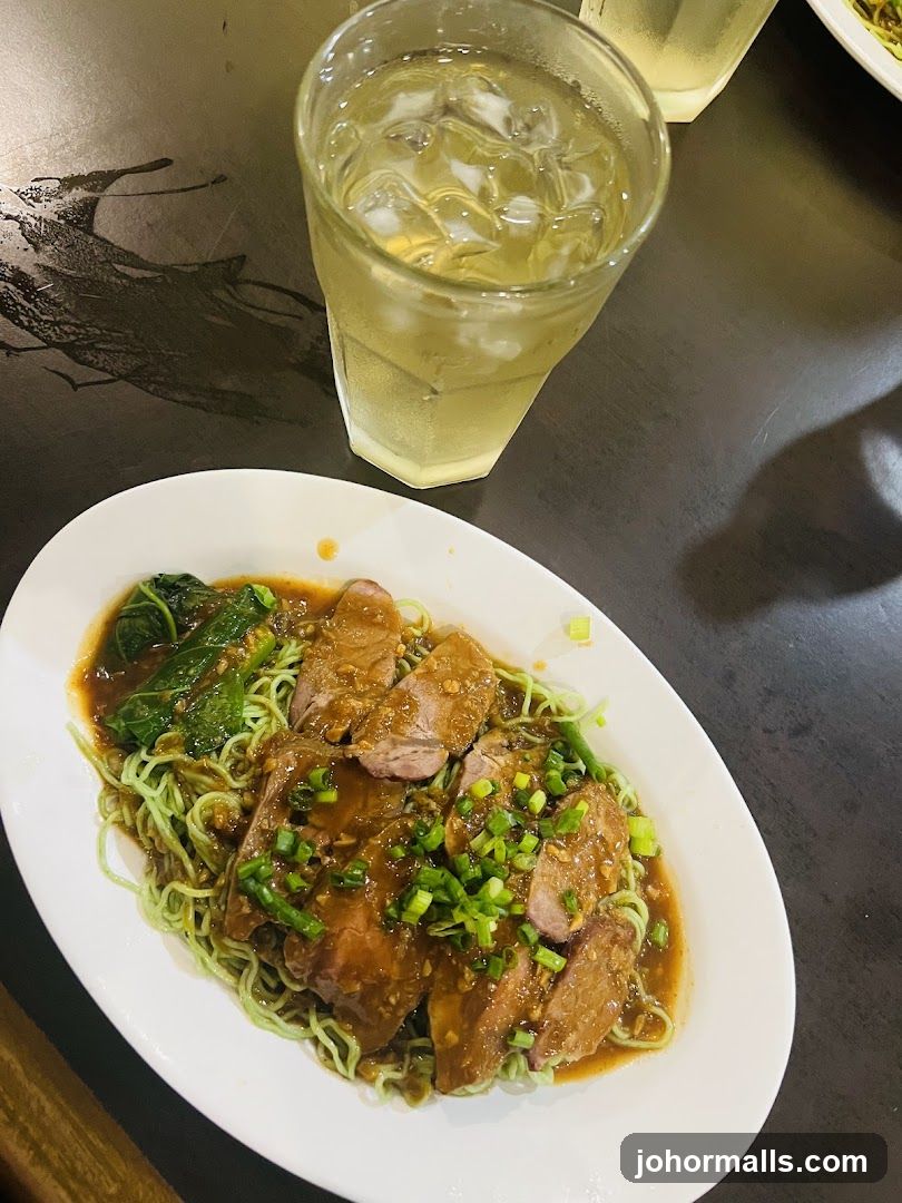 Duck Noodles with Greens and Drink