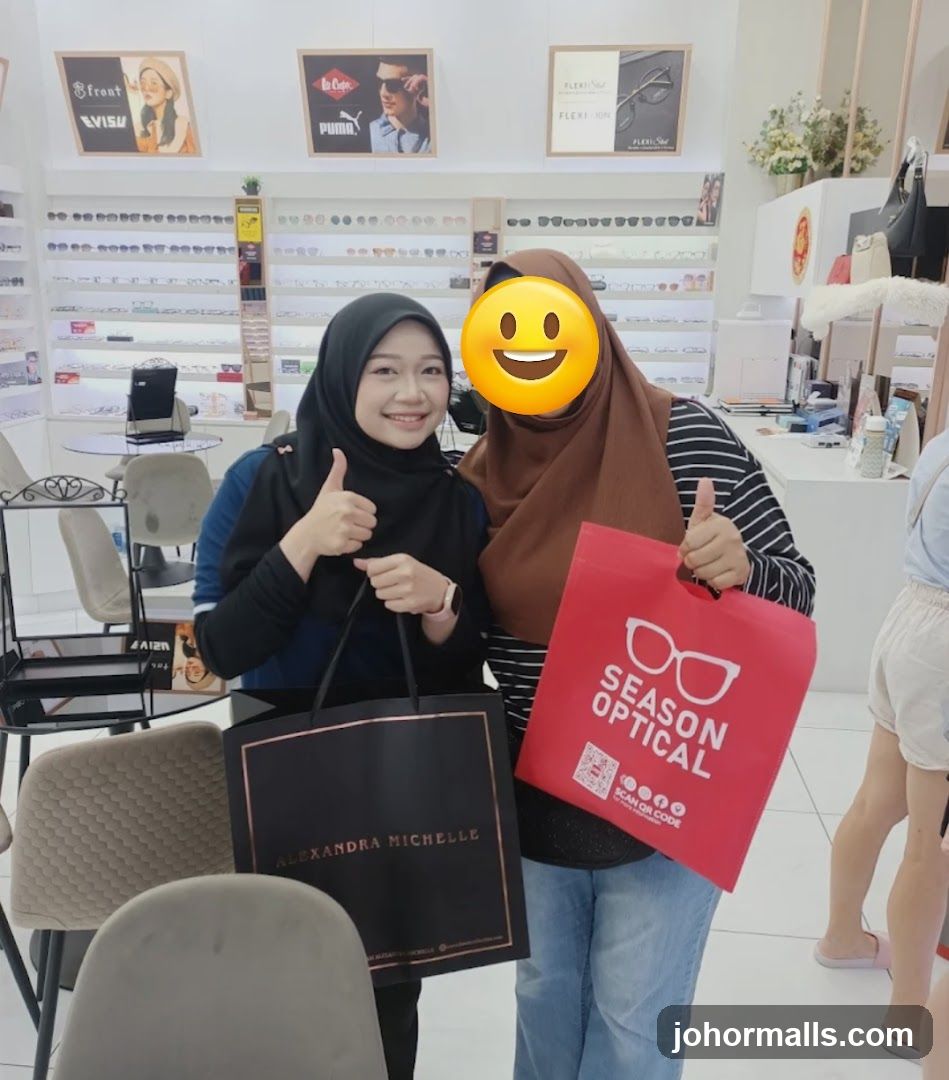Two Women Posing with Shopping Bags