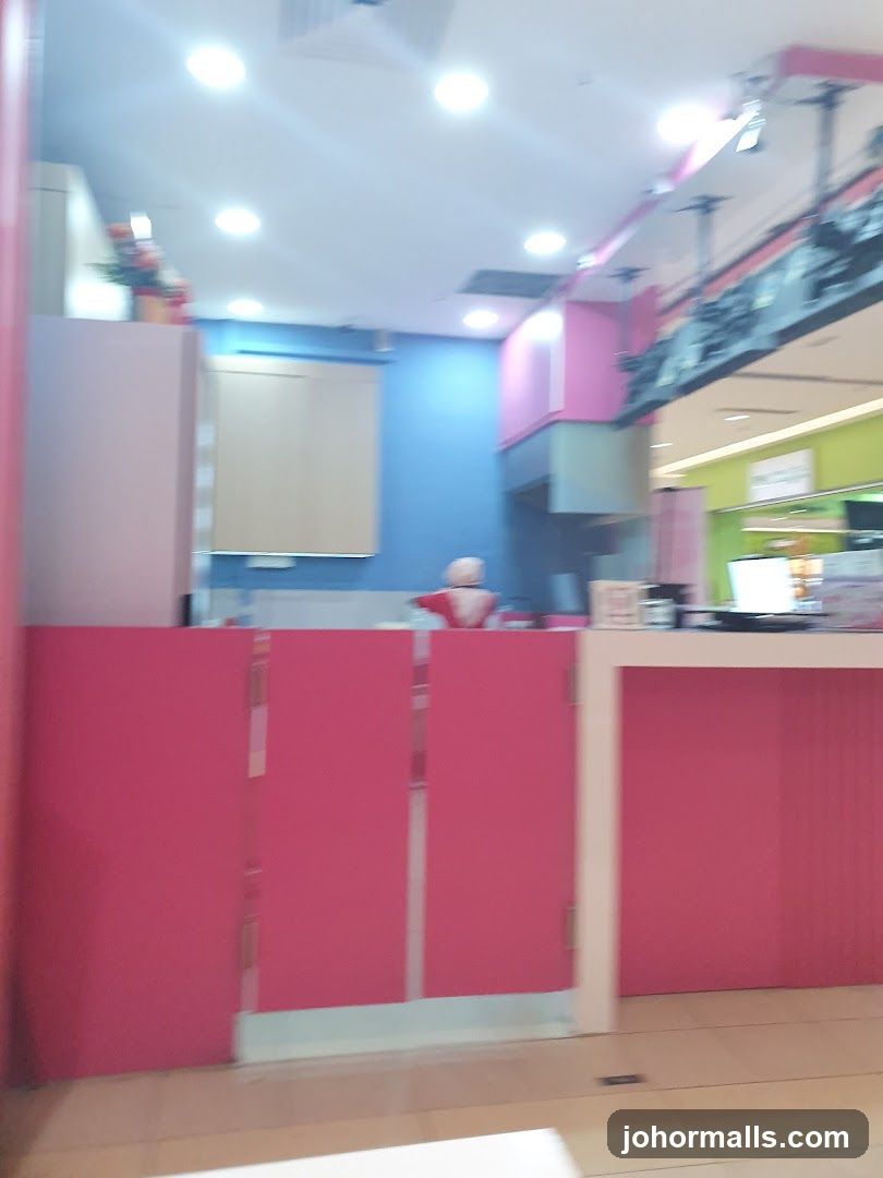 Pink counter with blue wall