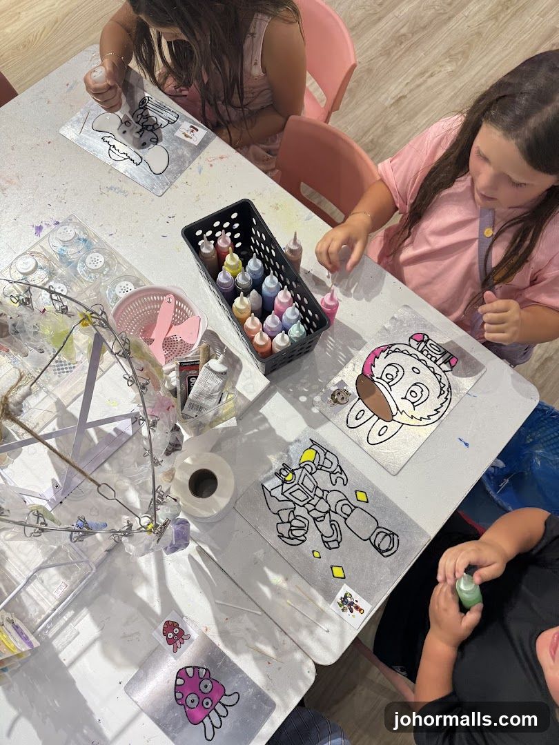 Children painting on glass