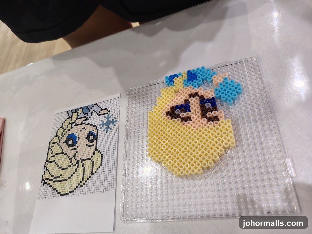 Perler bead art of Elsa
