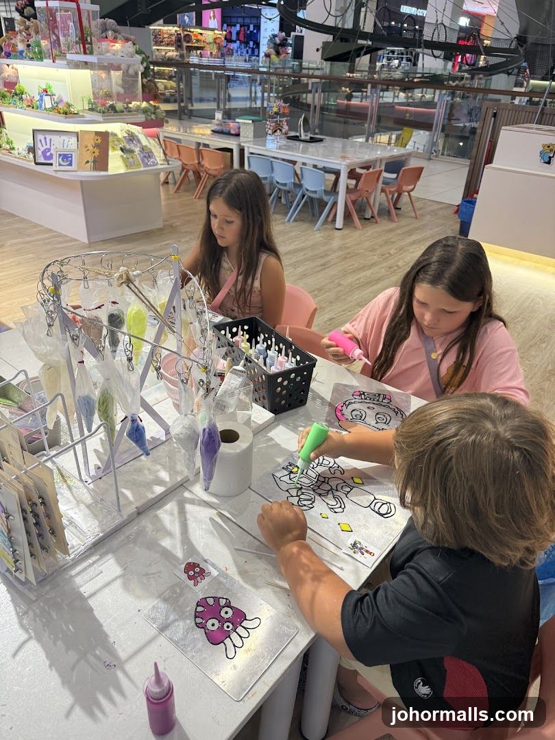 Children decorating at a craft table