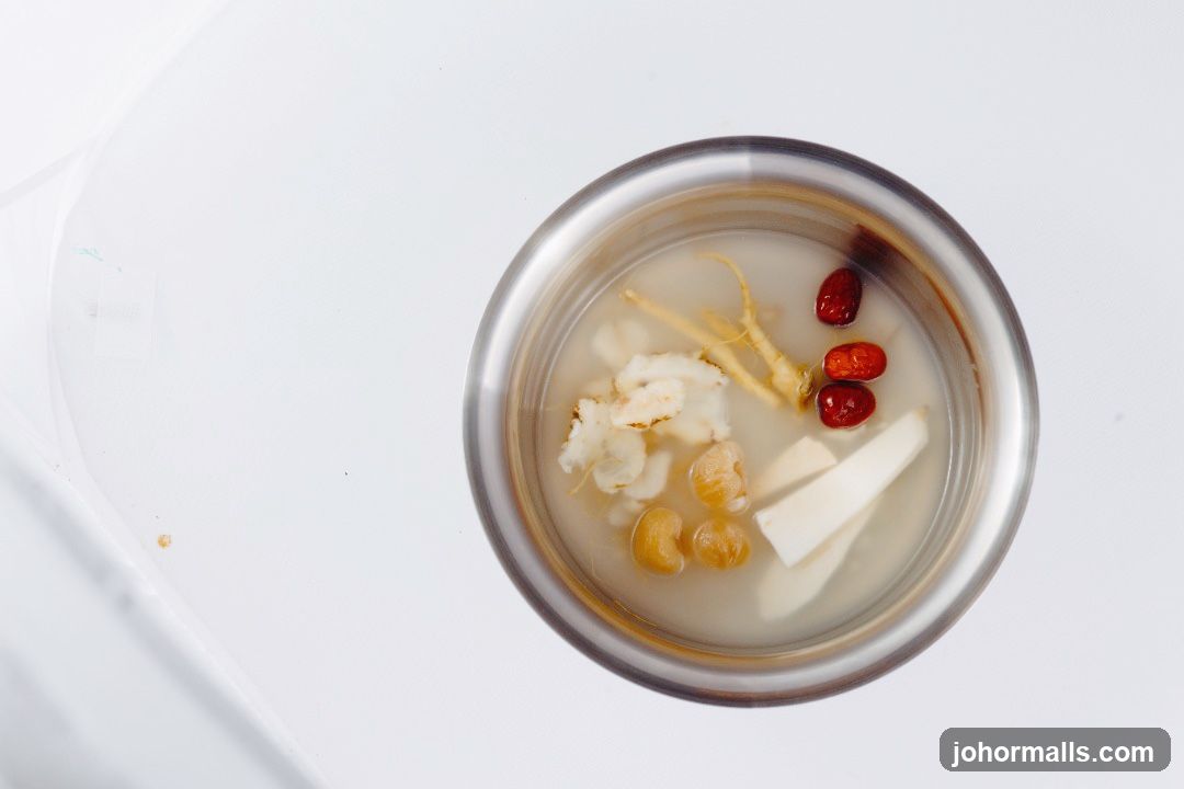 Bowl of Soup with Ginseng and Jujubes