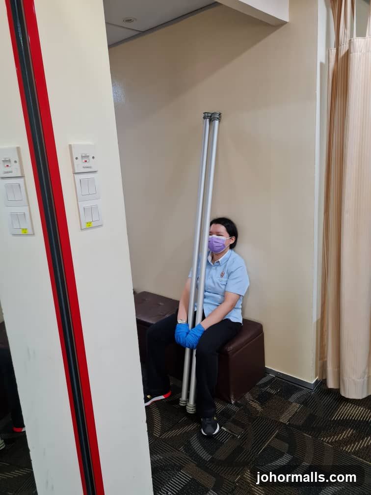Person holding poles