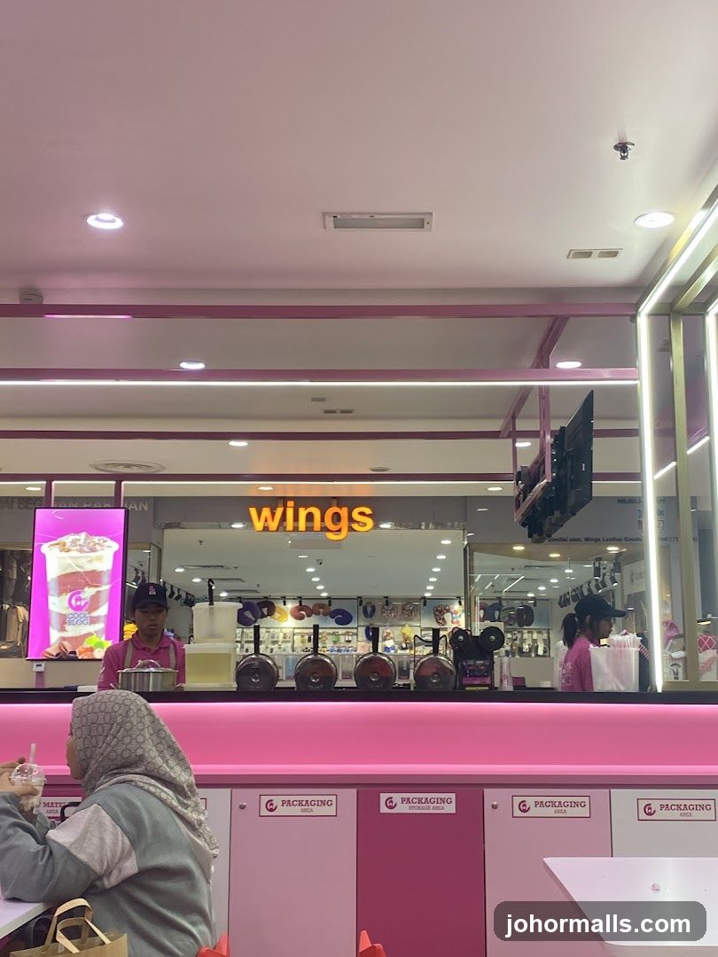 Food stall with "wings" signage