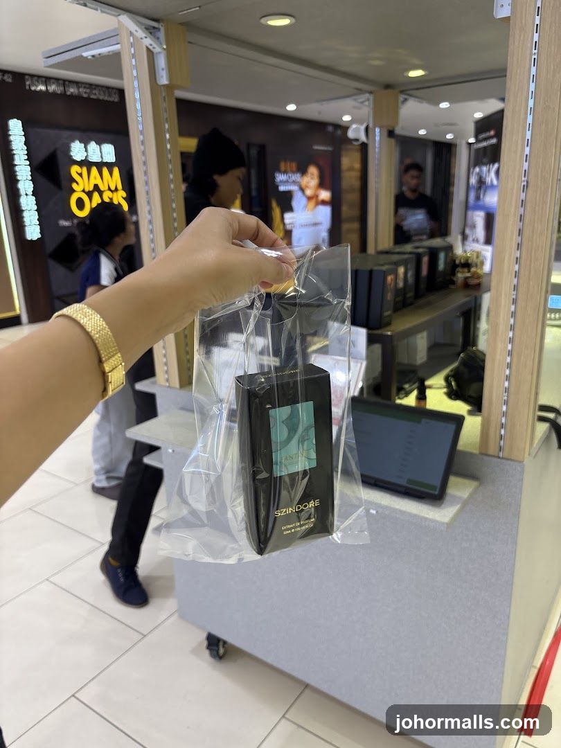 Perfume bottle in plastic bag
