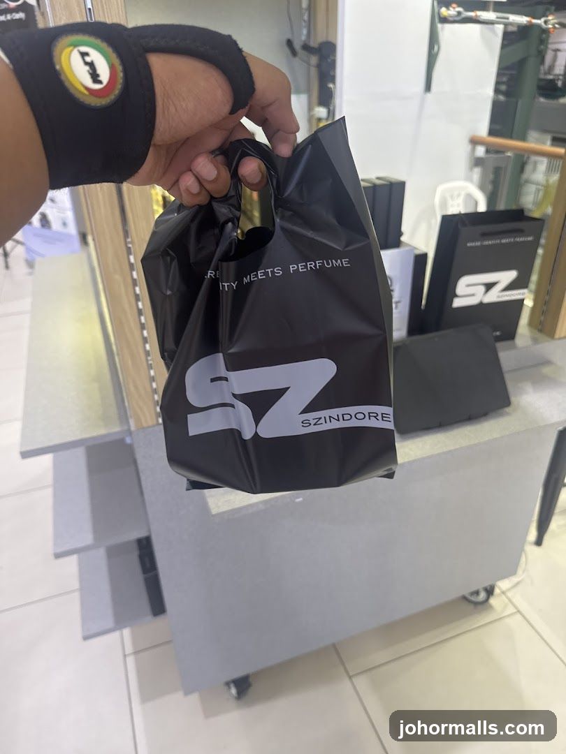 Person holding a shopping bag
