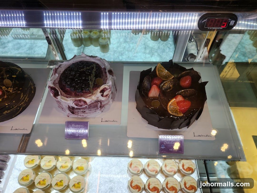 Cakes and Pastries in a Display Case