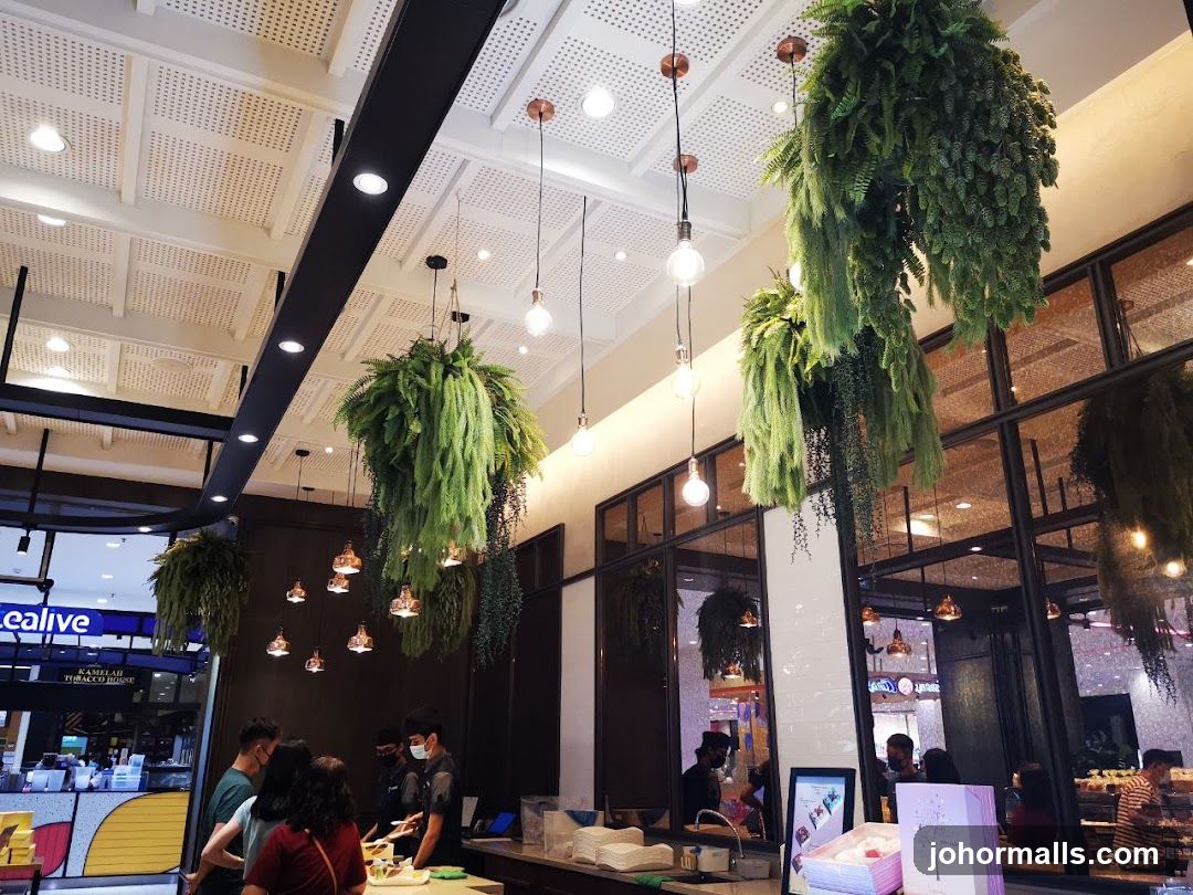 Interior of a cafe with hanging plants