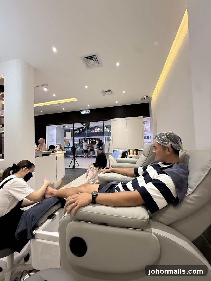 Man receiving a foot massage at a salon