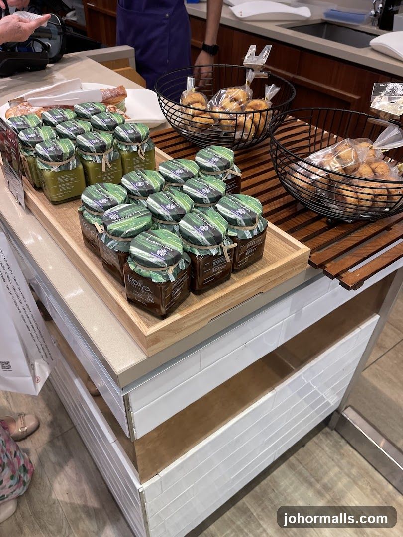 Jars of jam and baked goods on display