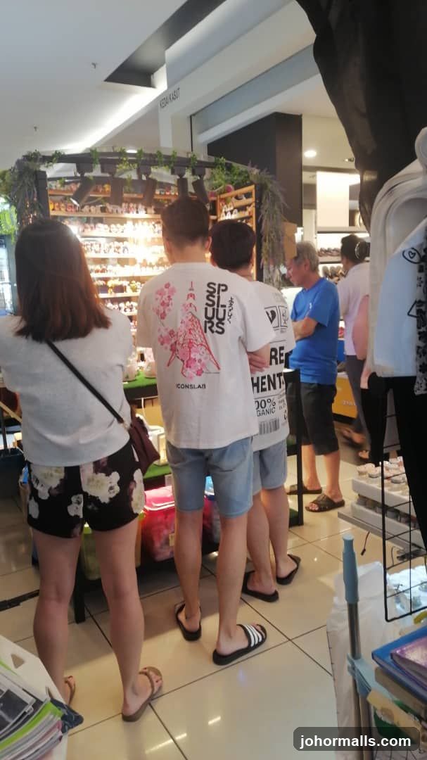 People browsing a store display